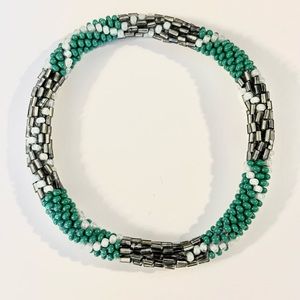 Aid Through Trade Roll On Bracelet